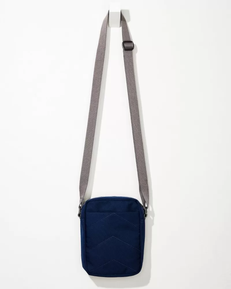 Bandolera Tommy Bahama Bond en Lona - Estilo Cruzado Versátil para Aventuras Diarias